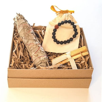 Sustainable medium white smudge sticks, Palo Santo, Seeds of Wonder's jewellery pouch and Alignment lava and Rudraksha bead bracelet in Kraft gift box filled with shredded Kraft paper